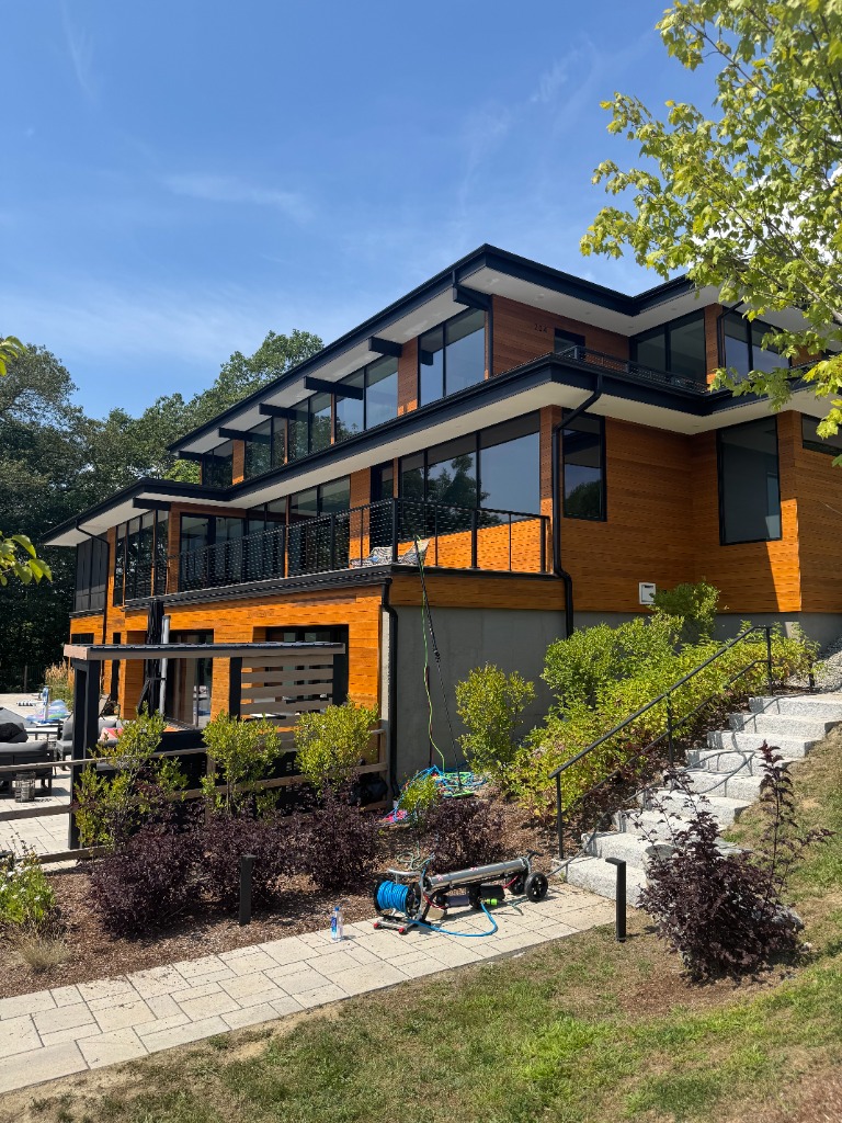 Modern wood-sided home with clean windows