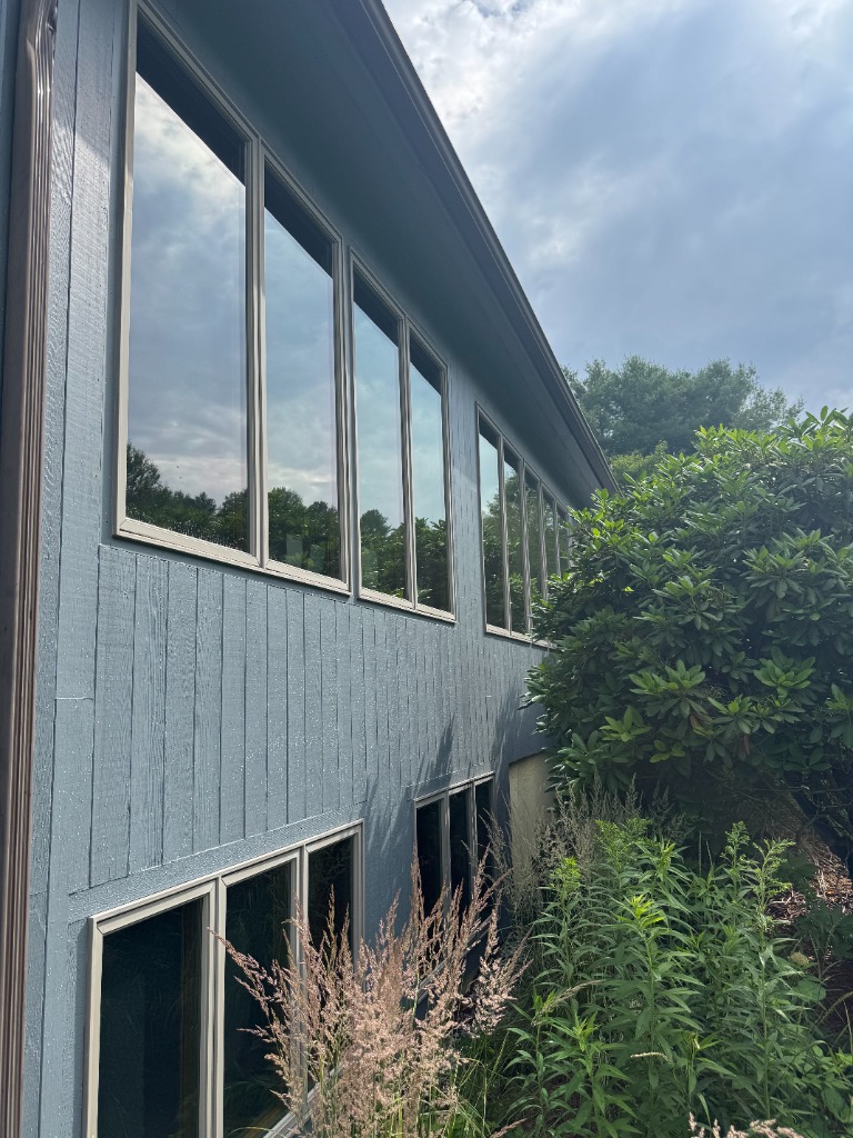 Blue house clean windows